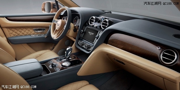 The tan and black leather front interior of a Bentley Bentayga SUV | Bentley Motors